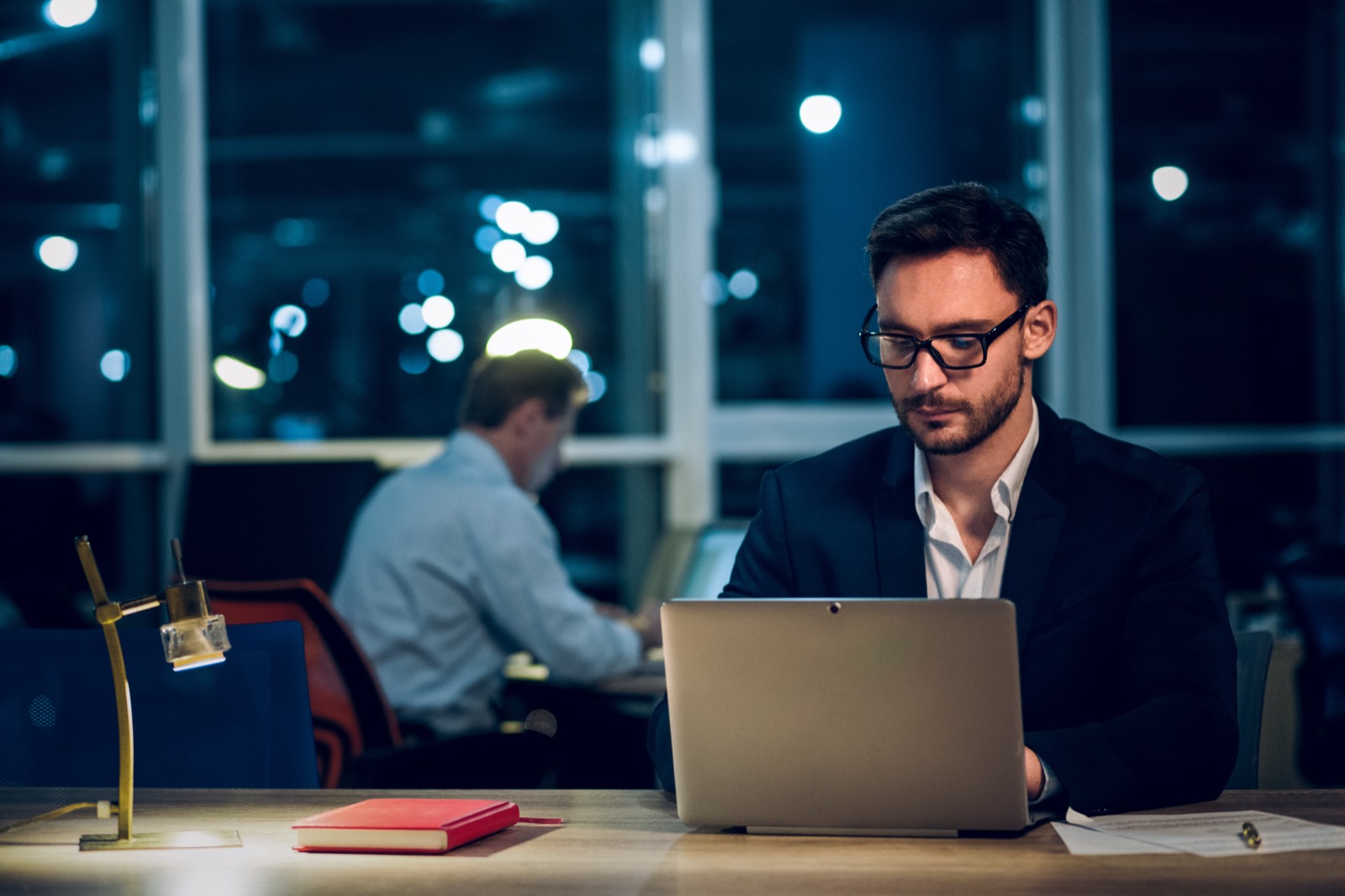 Professionals working late in a city office