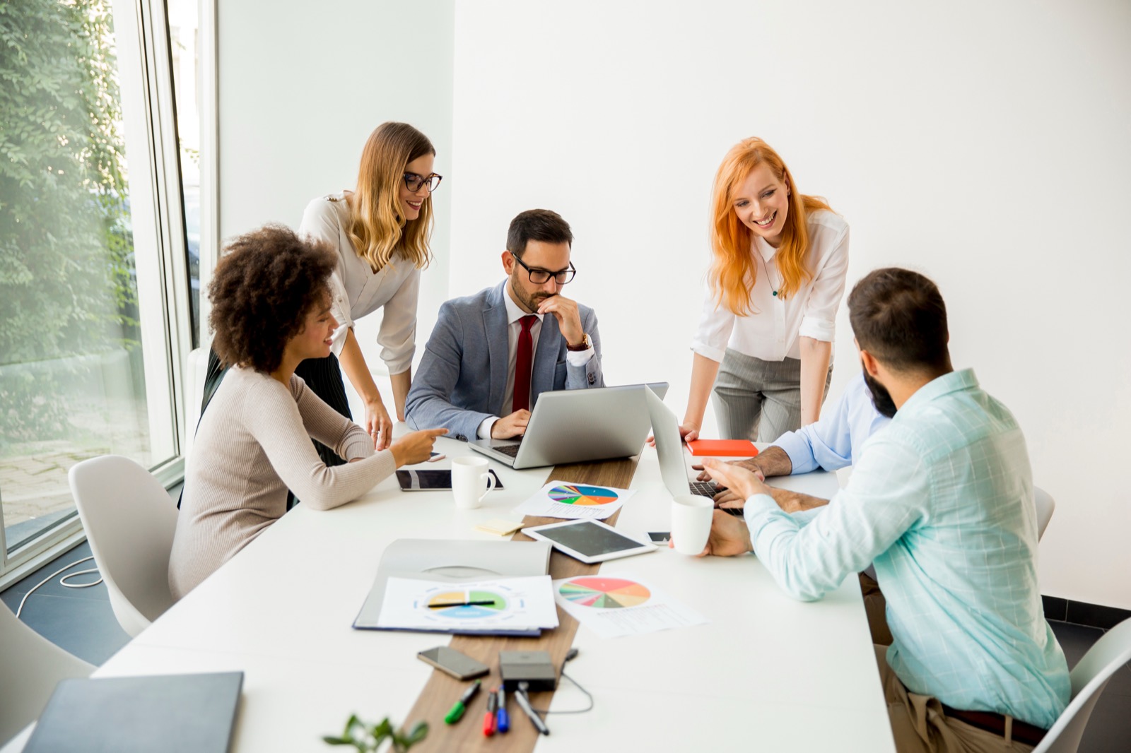 Team planning around a meeting table