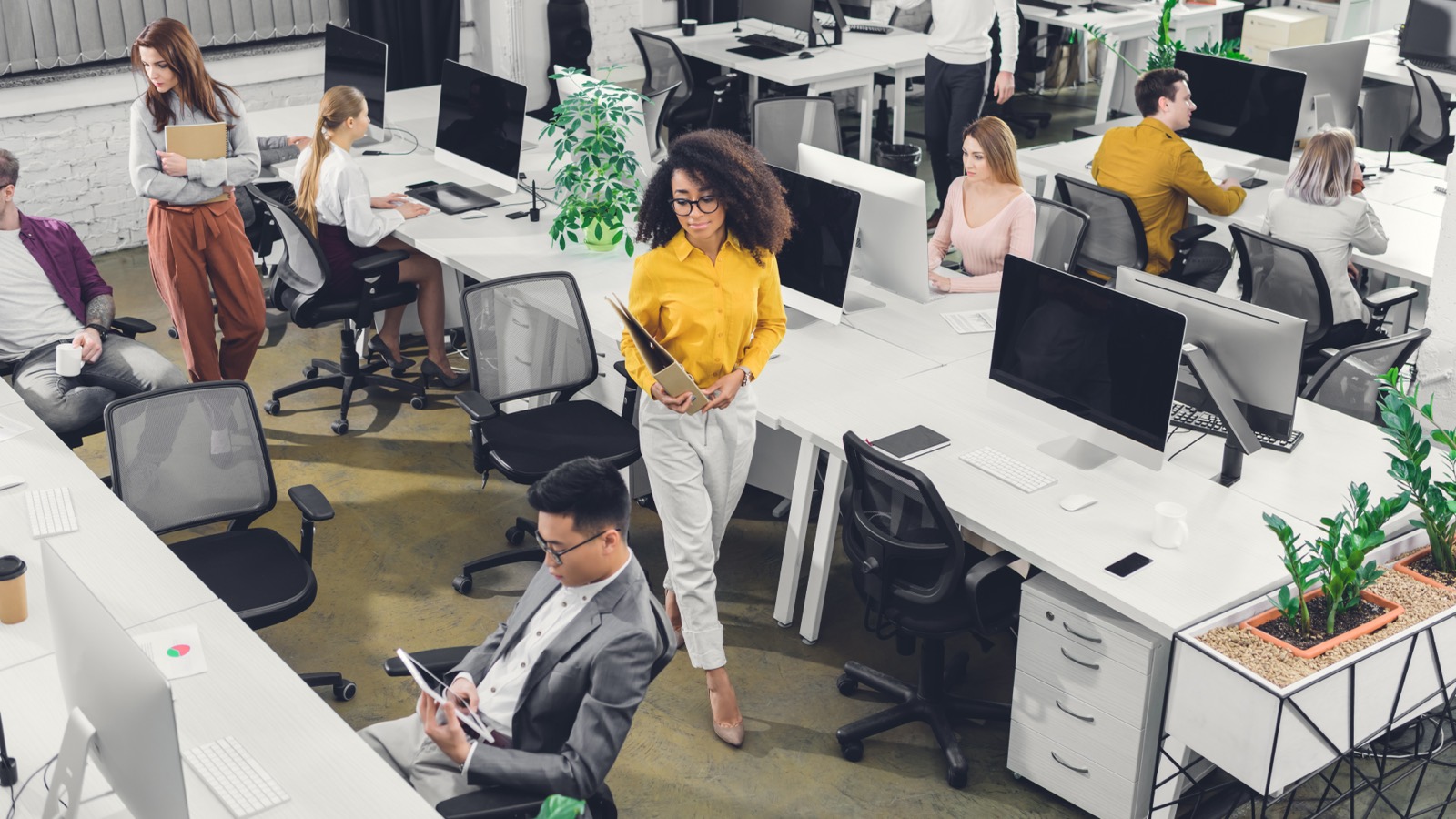 Open-plan office with staff at work
