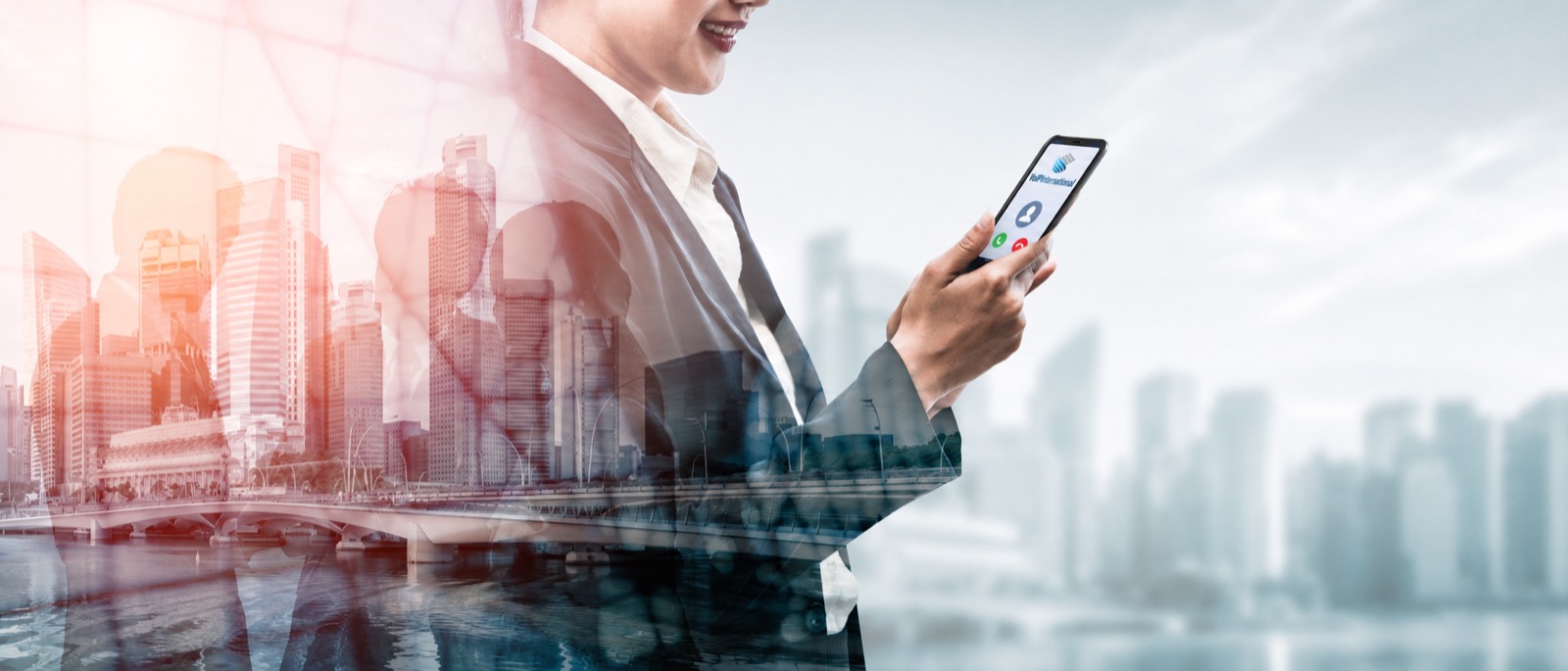 Professional using her phone in the city
