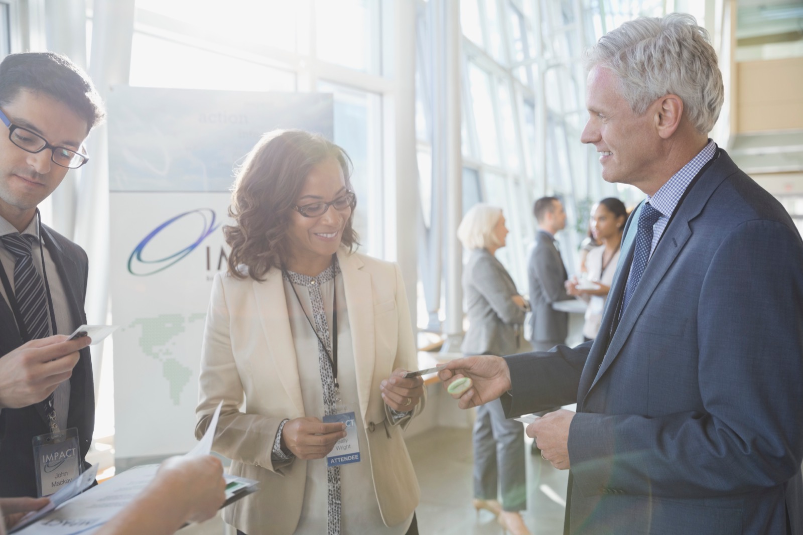 Real estate professionals greeting clients