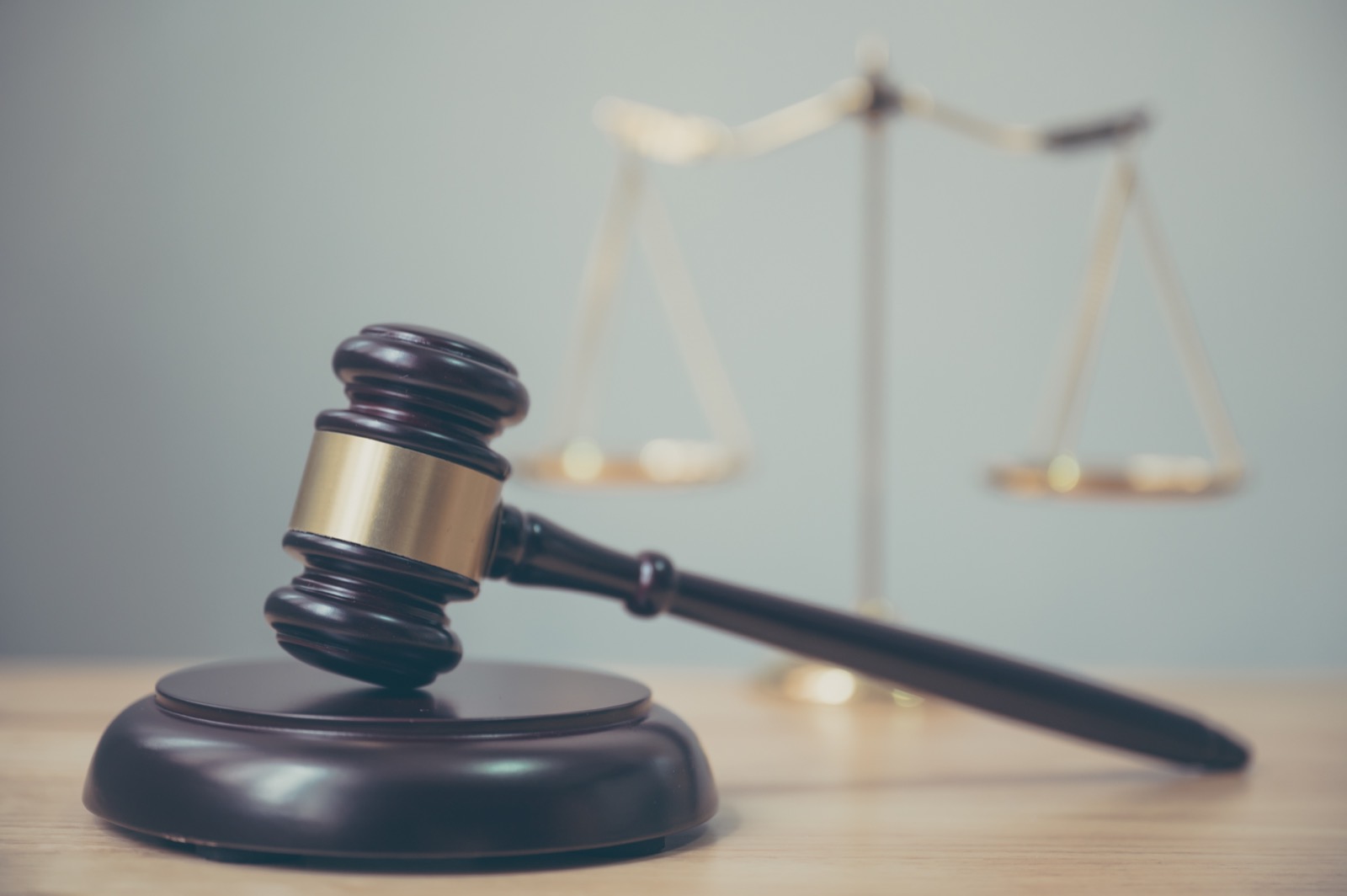 Gavel and scales on a law office desk