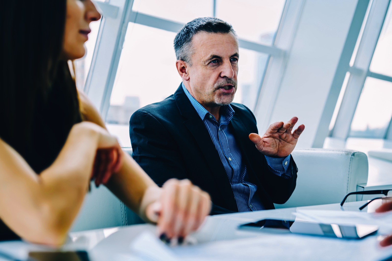 Manager talking with a colleague