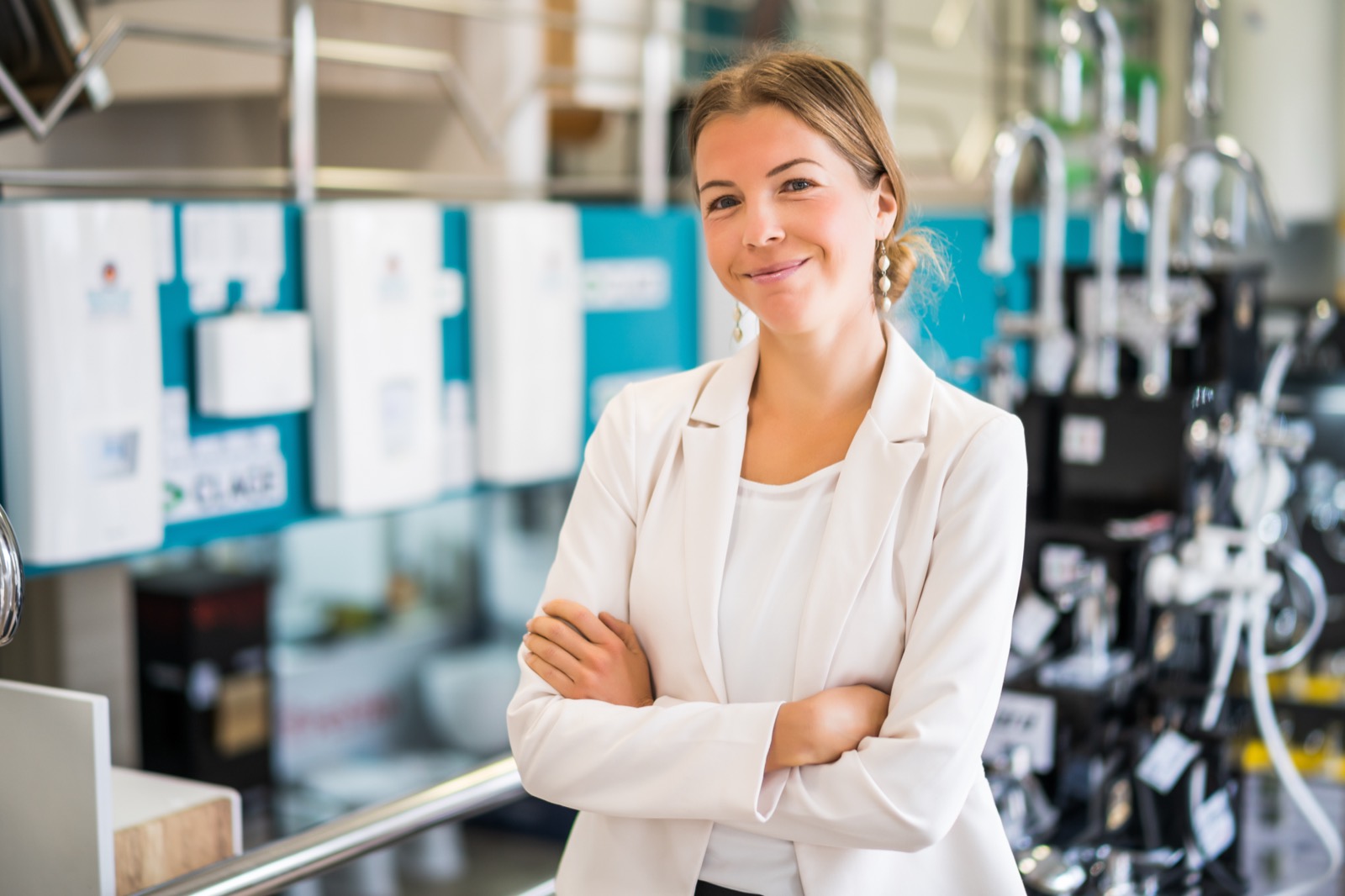 Owner standing in her service workshop